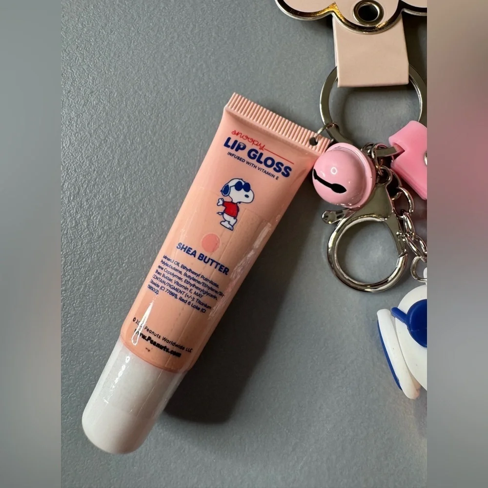 Peanuts x celavi Snoopy Pink and White Lip Gloss Keychain infused with vitamin E